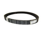 Black belt with visible branding on a white surface